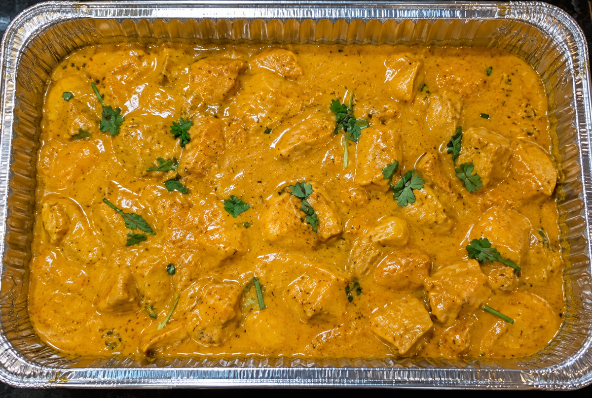 Chicken Korma (chicken in creamy korma sauce) catering tray from Arun's Indian Kitchen