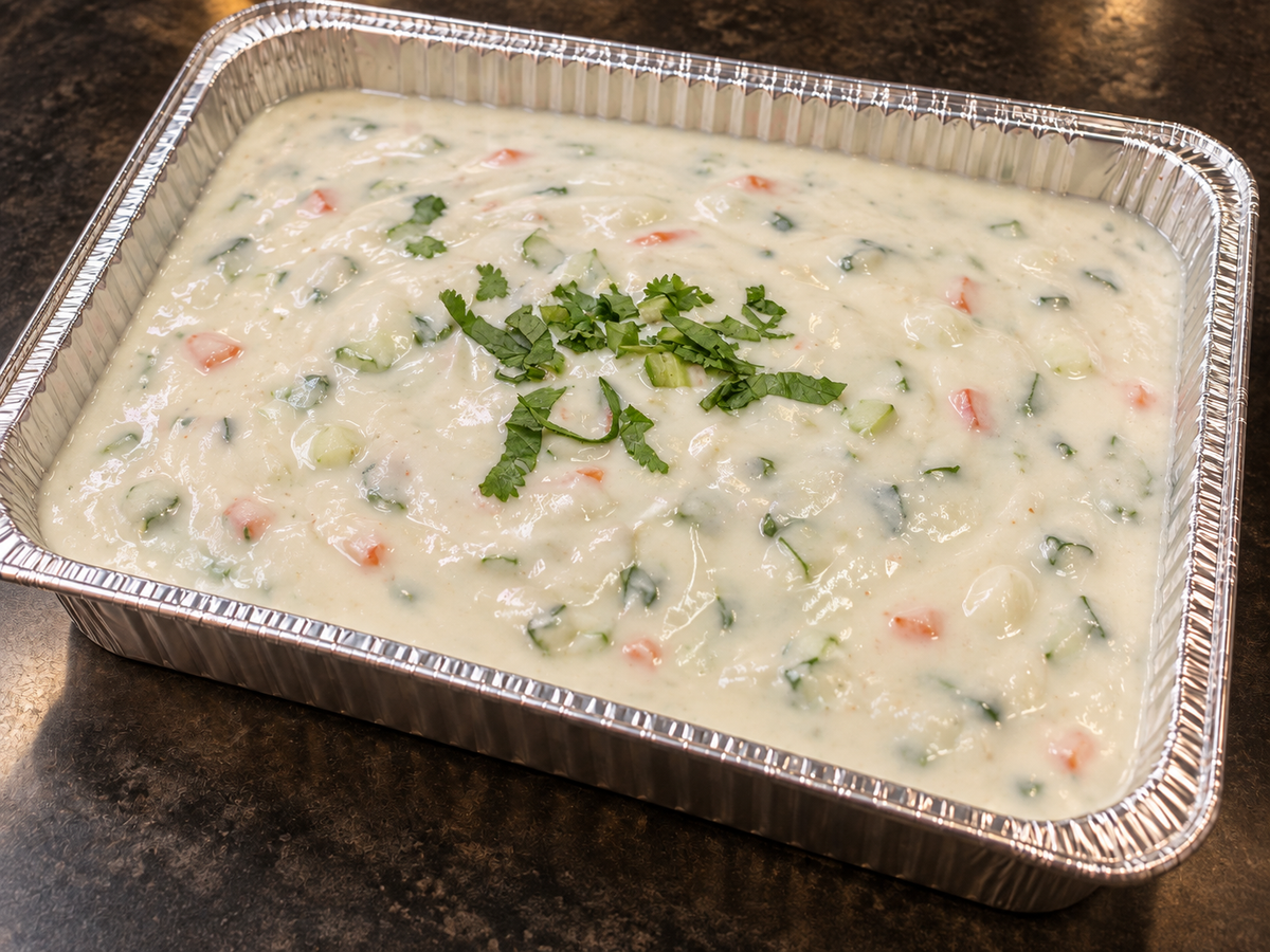 Raita (yogurt dip with cucumber) catering tray from Arun's Indian Kitchen