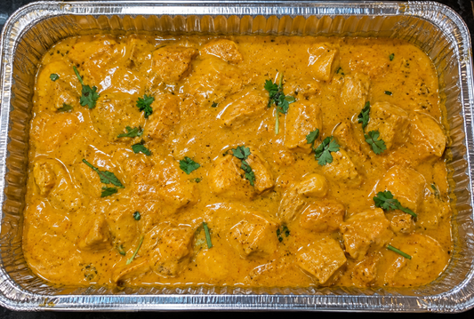 Chicken Korma (chicken in creamy korma sauce) catering tray from Arun's Indian Kitchen