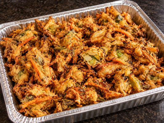 Vegetable Pakora (crispy vegetable fritters) catering tray from Arun's Indian Kitchen
